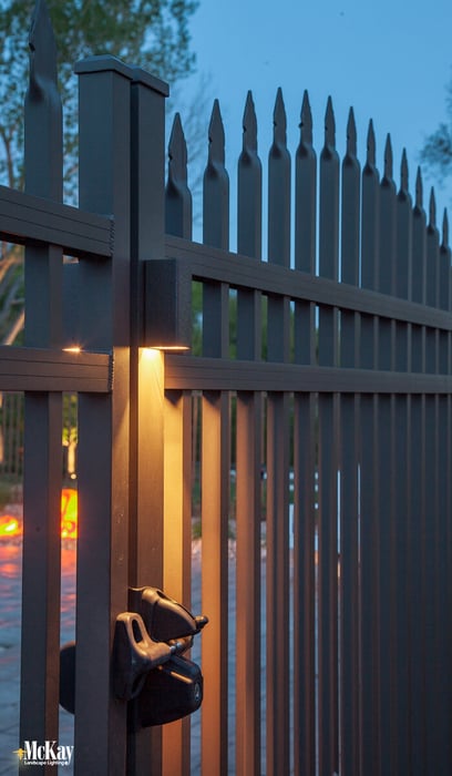 Installing an outdoor gate light directly above the entrance will provide ample light to the gate latch and the surrounding area. Opening your gate at night will be considerably easier while providing a safer way to enter your backyard.  Click to learn more... | McKay Landscape Lighting - Omaha Nebraska