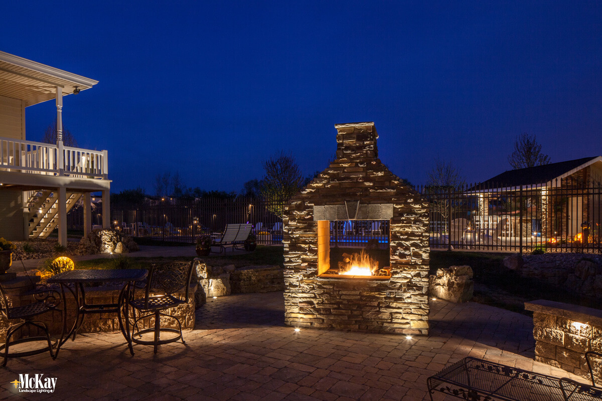Patio Outdoor Stone Fireplace Lighting Omaha NE McKay Landscape Lighting H 20