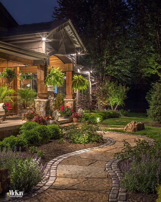 The key to using path lights is finding the perfect balance for your walkway. Too many lights will give a runway type of look while too few lights will leave dark spots. Learn more about path lighting... | McKay Landscape Lighting Omaha Nebraska