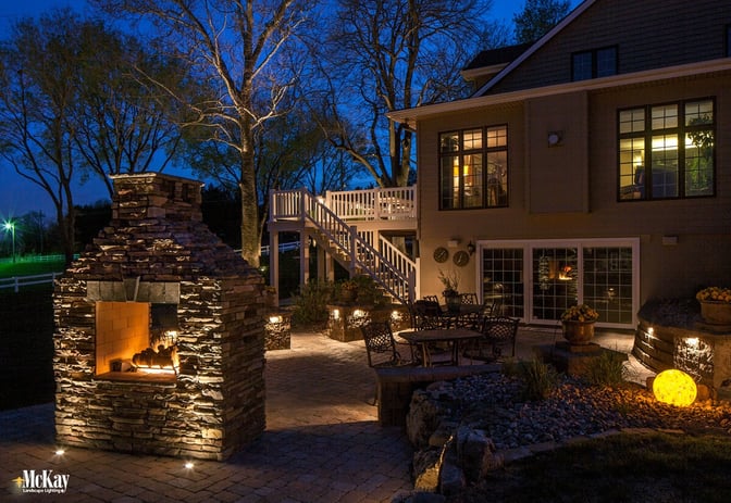 outdoor lighting around stone fireplace omaha nebraska 