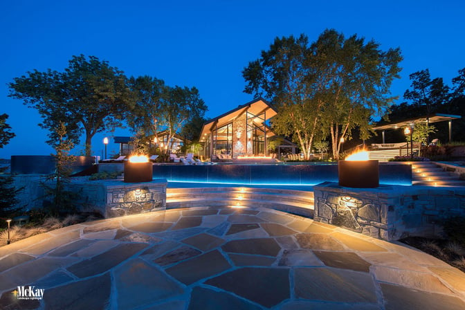A control system was used to create separate light scene selections that allow the homeowner to easily adjust the outdoor lighting depending on what they are doing or the event function with their phone or tablet. Click to learn more lighting this outdoor space... | McKay Landscape Lighting, Omaha, Nebraska