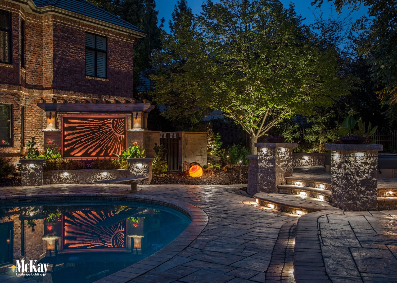 hardscape lighting around a resort style pool